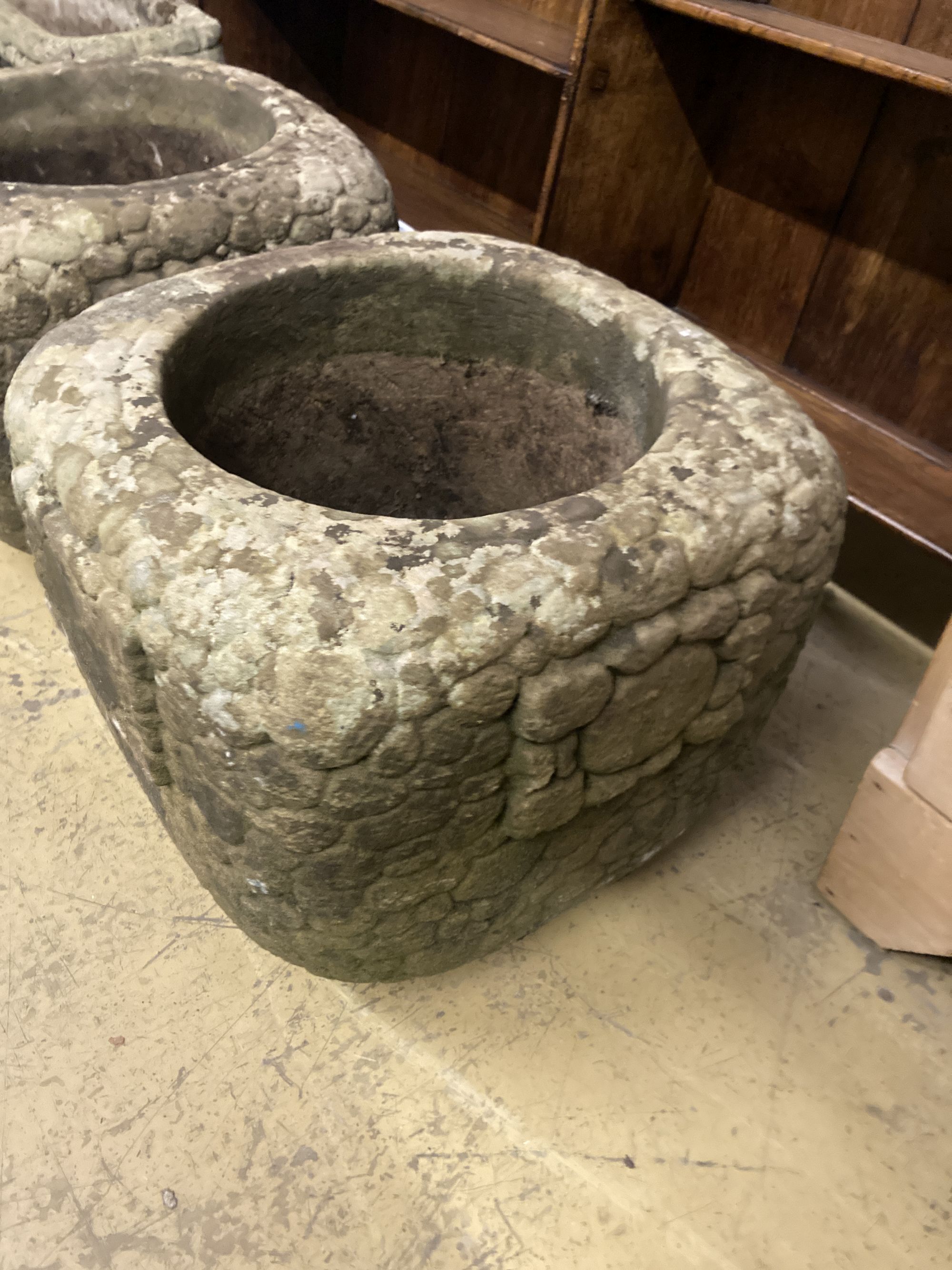 A pair of square pebble effect reconstituted stone garden planters, width 39cm, height 33cm